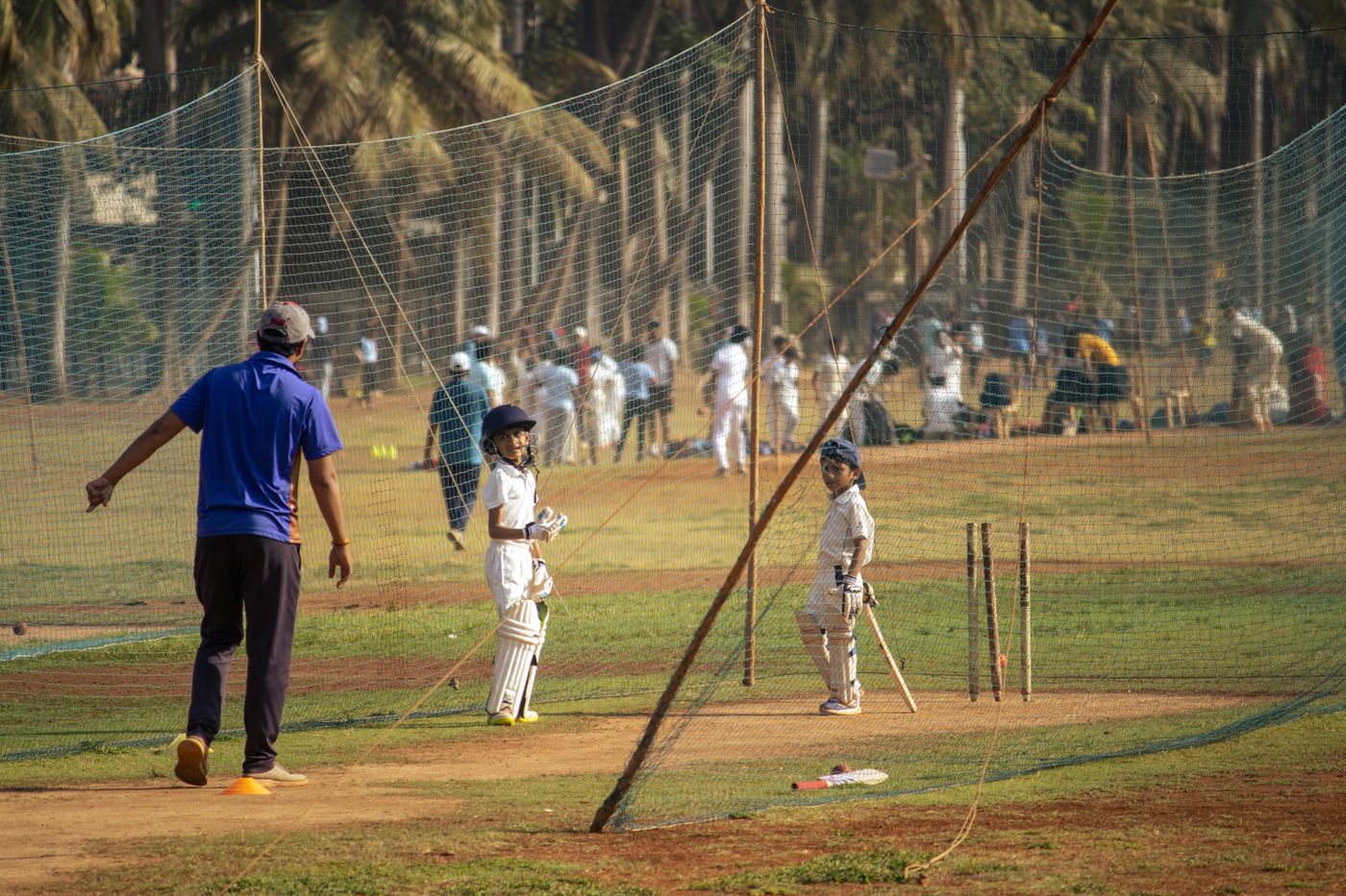 Students at cricket practice on the school ground