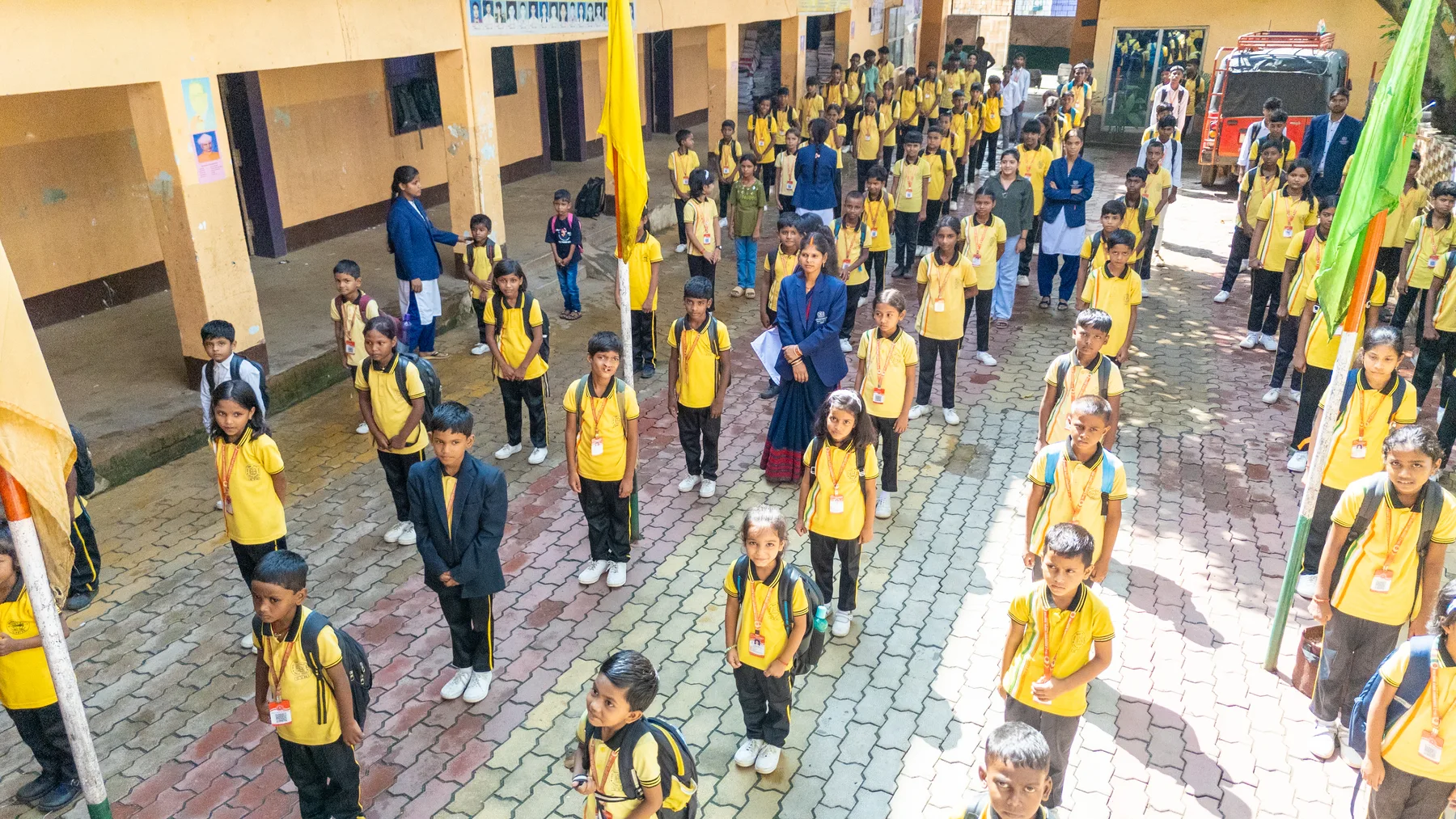 Students lined up in the courtyard for morning assembly