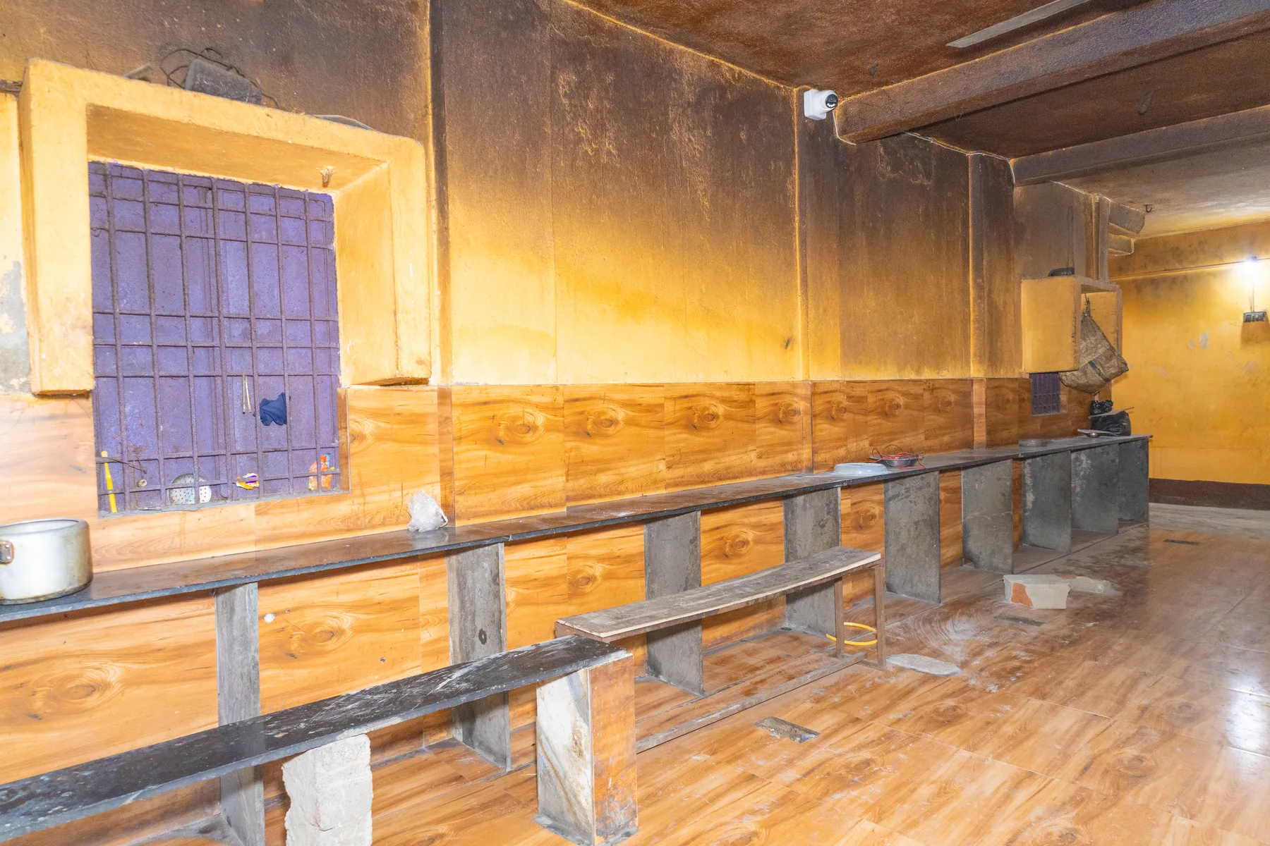 The dining hall laid out with benches