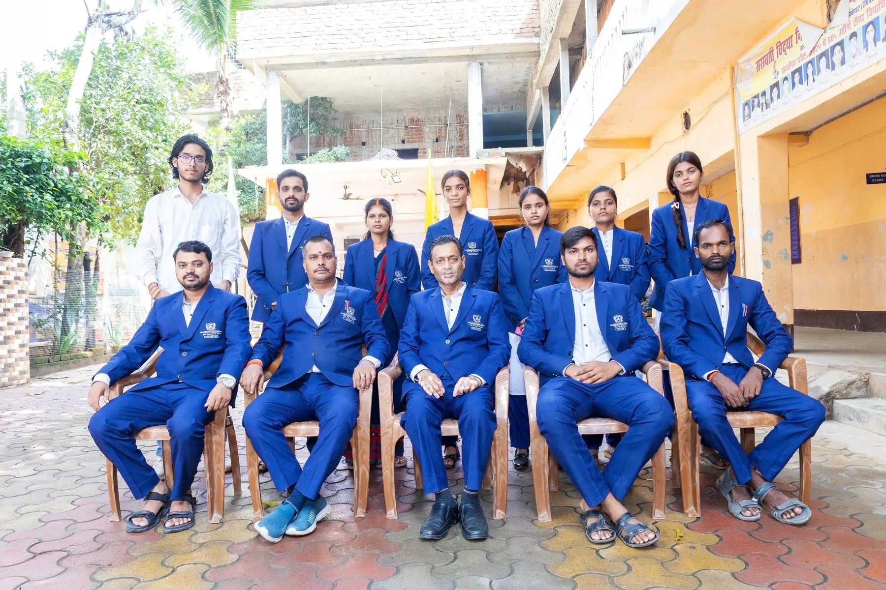 The teaching staff photographed together on the verandah